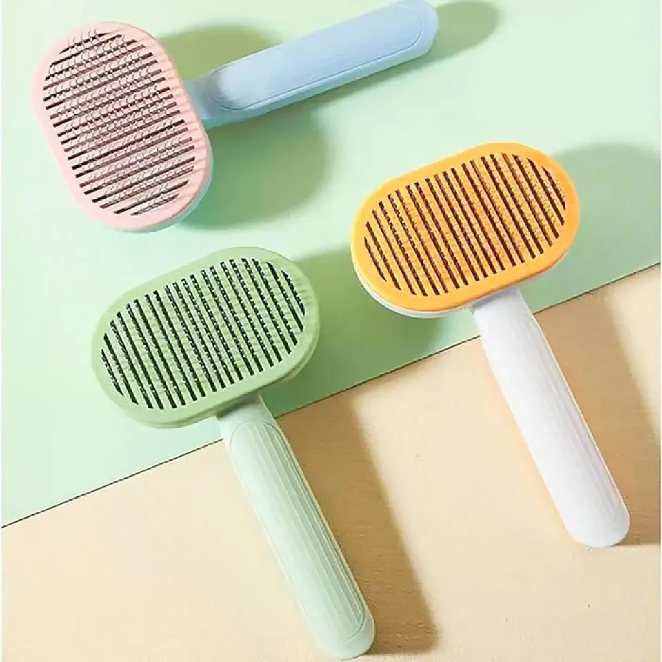 برس سگ و گربه با قابلیت تخلیه مو طرح گربه Rectangle Cathead Self Cleaning Grooming Brush for Pet